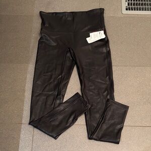 NWT size large Spanx 
Black Faux Leather Leggings